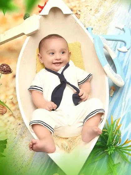 A happy four-month-old sailor! Milestone sessions are perfect for capturing your baby's development, like their growing smiles and expressions.