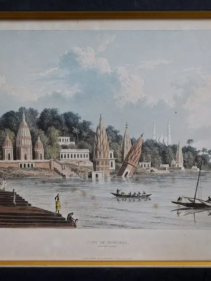 This captivating aquatint by T. Sutherland presents a serene view of the Ghats of Benares. These pieces are not just artworks; they are living testimonies of a bygone era, brought to life with exquisite detail and finesse.