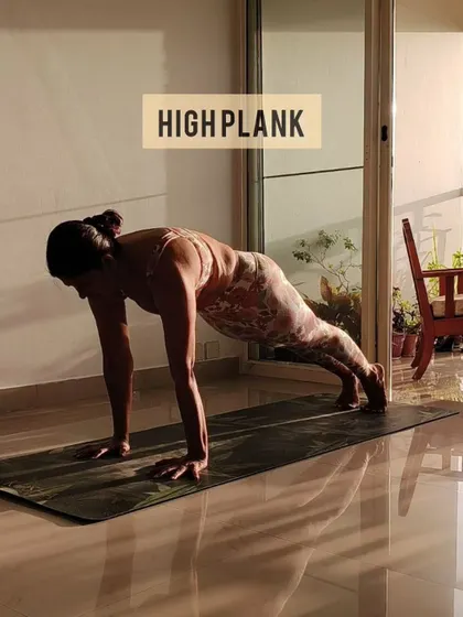 The high plank is a full-body exercise that strengthens the arms, shoulders, core, and legs. It's a foundational pose that prepares you for more challenging movements in both yoga and other fitness disciplines.