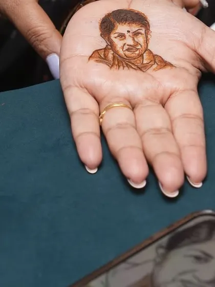 Another angle of the Lata Mangeshkar portrait, showing the reference photo on the phone. This demonstrates the accuracy I strive for in my figure work.