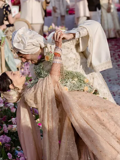 A playful dip and a shared laugh make for the best memories. I always encourage my couples to be themselves, and I design the flow of the event to allow for these spontaneous, happy moments to happen naturally.