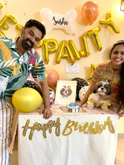 A happy family photo with the birthday girl, Sushi. We are proud to be a part of these cherished family moments.