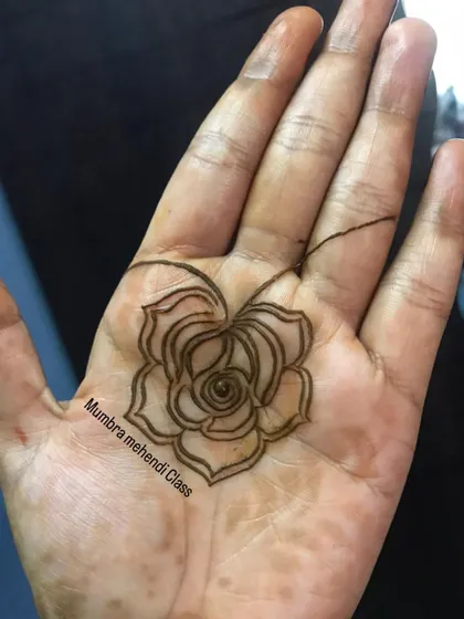 The very first step: a simple rose outline. Every great design starts with a confident line.