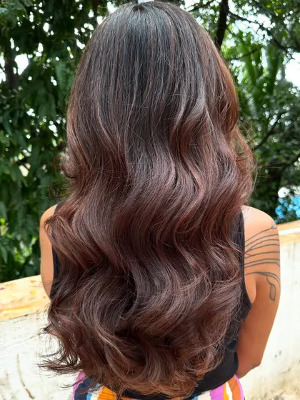 The back view of her holiday hair, showing the healthy shine.