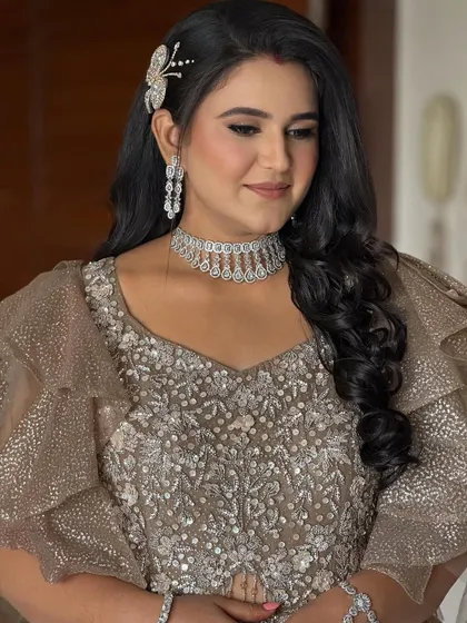 A close-up of the bride's reception glam. The look is bold and beautiful, with a focus on the eyes and a flawless, glowing complexion.