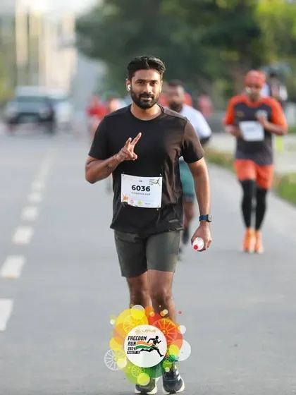 A runner in his element during the 5k Freedom Run through the hilly terrain near Turahalli forest.