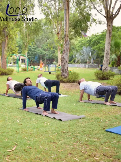 The reverse tabletop pose is an excellent way to strengthen the back, glutes, and arms while opening up the chest and shoulders. It's a staple in our group yoga classes.