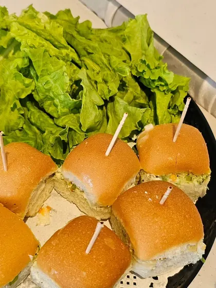 Say hello to our new Pav Bites! These mini bread rolls filled with a savory mixture are a quick and delightful appetizer, perfect for passing around at any gathering.