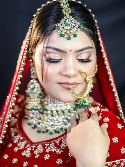 A soft, romantic bridal look with closed eyes to feature the shimmering eyeshadow. Our students learn to create looks that are perfect for wedding photography.