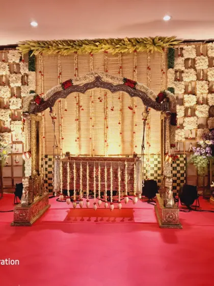 A wider angle of the traditional 'chatai' mat and jasmine flower cradle ceremony stage.