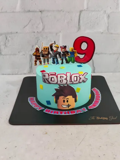 Another angle of the popular Roblox birthday cake. We can customize it with your child's favorite characters and their name for a truly personal touch.