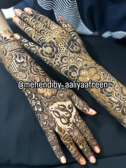 Making your mehendi personal is my favorite part. Here, I've woven my own name, "Aaliya," into the design to show you how we can include your or your partner's initials to make the art uniquely yours.