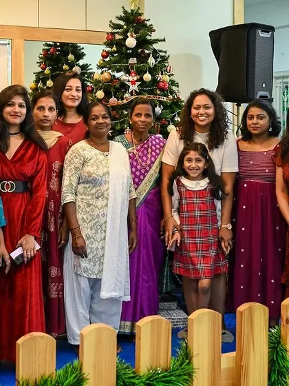Our entire team, including support staff, celebrating together at the Christmas party.