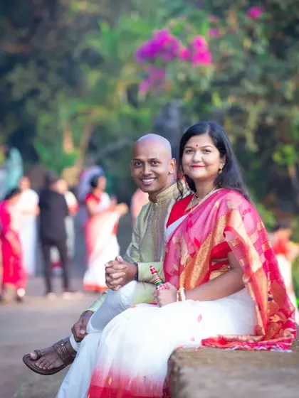 A relaxed, candid portrait of a Bengali couple enjoying a quiet moment together during their pre-wedding shoot.