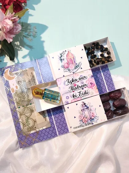 The beautiful pull-out drawer Eidi envelope, filled with goodies.