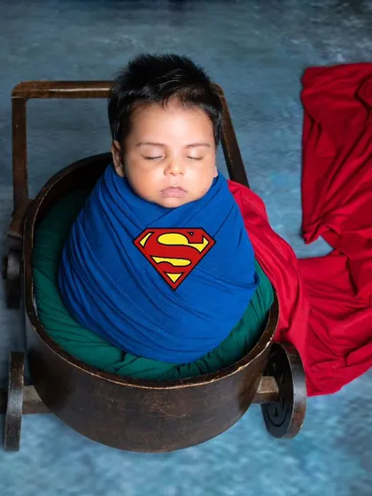 Every baby is a superhero in their parents' eyes. This simple but powerful Superman-themed newborn shot is perfect for capturing that sleepy, peaceful strength in your little one.