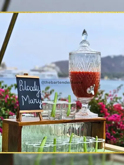 Our signature Bloody Mary station, overlooking a stunning view. We serve this classic cocktail from an elegant dispenser with all the right garnishes for a perfect brunch drink.