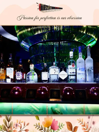 A premium liquor display at our Udaipur event, showcasing the top-shelf brands we bring to our destination weddings.