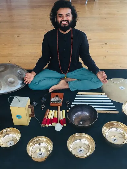 A photo of me sitting with my setup of instruments for a sound healing TTC in Casablanca.