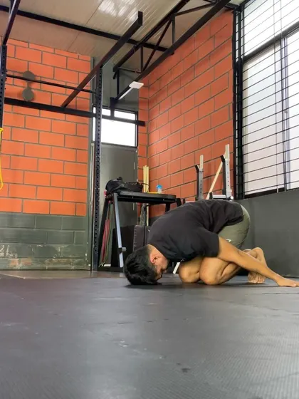A child's pose with a lat stretch. Gentle mobility work was important in the early stages of my recovery to maintain range of motion without causing pain.
