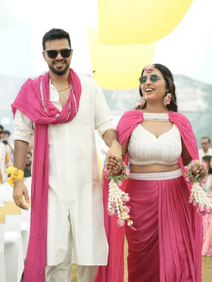 The grand entrance of the happy couple at their colorful Haldi ceremony. I make sure their entry is full of energy and excitement.