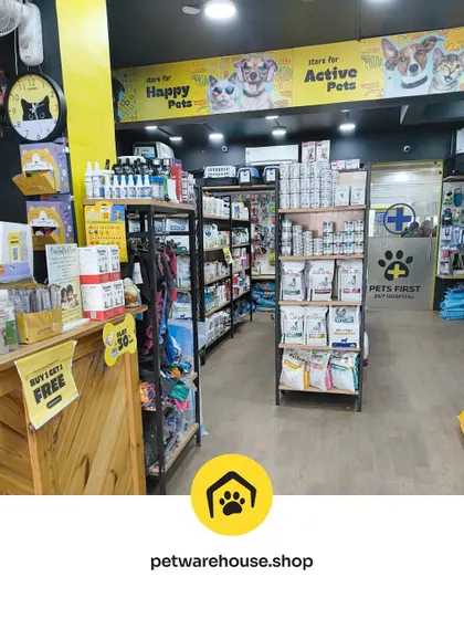 A glimpse into our well-stocked store. You can see shelves full of health supplements, pet food, and a 'Buy 1 Get 1 Free' offer sign, showing the value we provide.