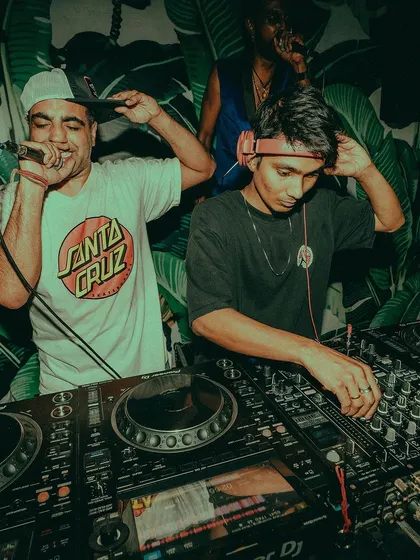 Sharing the deck with an MC, bringing that live, collaborative energy to the crowd. I often work with rappers and hosts to create a dynamic performance, making the night more than just a DJ set. It’s a full show.
