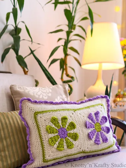 Another beautiful shot of the floral cushion, nestled amongst plants and soft light. It’s all about creating happy spaces, one stitch at a time.