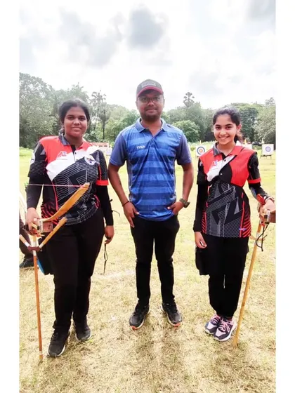 A photo with two of our competitors at the CISCE Regional competition. I'm proud to coach these dedicated young athletes.