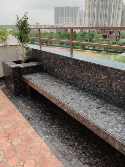 A close-up of the custom-built granite seating on the DLF terrace. We use robust materials to ensure outdoor furniture and features can withstand the elements.
