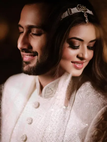 A serene and intimate portrait. We focus on capturing the soft, gentle moments that speak volumes about a couple's love.