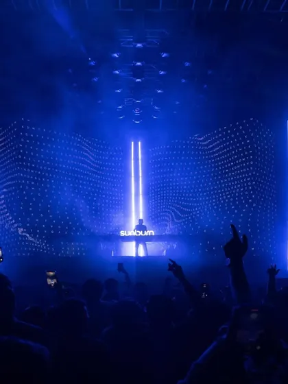 The energy of Dimitri Vegas & Like Mike is contagious. A single DJ on a massive stage, completely owning the moment with a sea of fans before him.