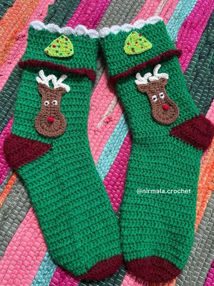 Getting into the festive spirit with our handmade Christmas stockings. This pair features a cute reindeer and a little Christmas tree, all crocheted with care.