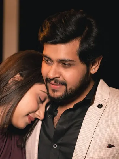 A quiet, tender moment with her resting her head on his chest. This close-up is full of emotion and trust.