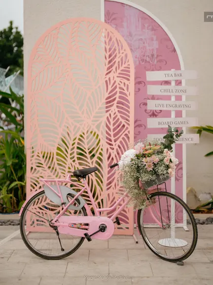 A close-up of the charming pink bicycle prop.
