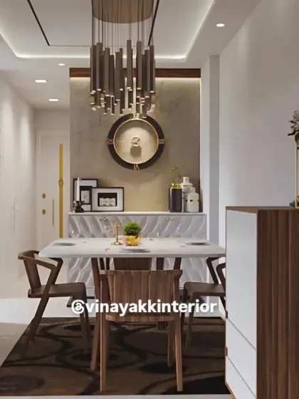 This dining space is designed for making memories. The statement chandelier draws the eye, while the blend of rich wood and marble creates an atmosphere of understated luxury, perfect for hosting and everyday meals.