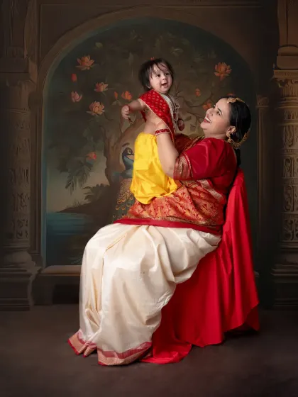 A joyful moment between mother and child during our 'Lil Kanha' themed shoot, full of laughter and love.