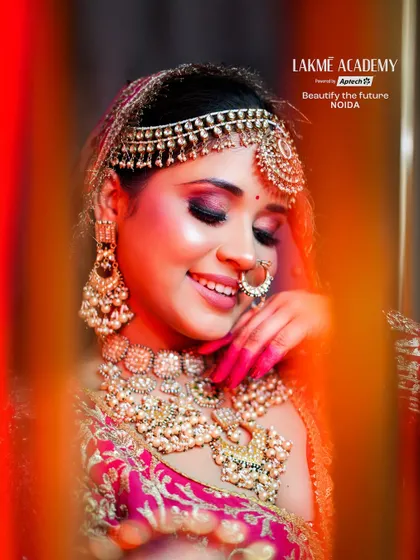 A happy bride is the most beautiful bride. This shot captures the joy and confidence that comes with a perfectly executed bridal makeup look, featuring a bright smile and sparkling eyes.