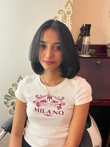 Aleena looking happy with her new, shorter style.