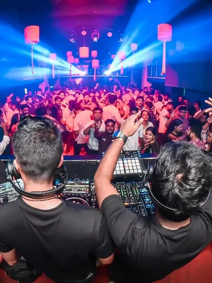 The view from our console during the Durga Puja celebration. It's an amazing feeling to see a packed dance floor moving to the beats and visuals we've curated.