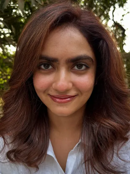 A portrait of the client with her new 'Cowboy Copper' hair.