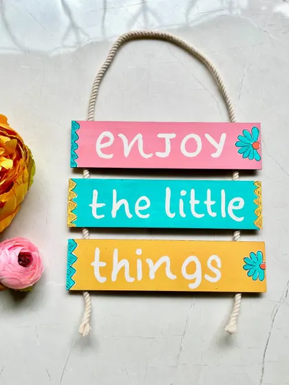 A simple, beautiful reminder to "Enjoy the little things." Life's greatest joys are often in the smallest moments.