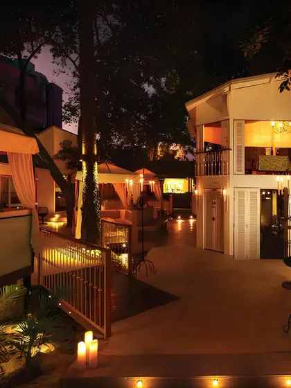 Our restaurant at dusk, lit by candles and candelabras, creating an atmosphere of timeless romance. This is the perfect setting for an unforgettable evening.