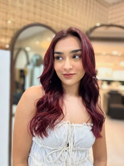 From another angle, you can see how the red wine colour catches the light. This is a perfect choice for someone looking for a bold yet sophisticated change.
