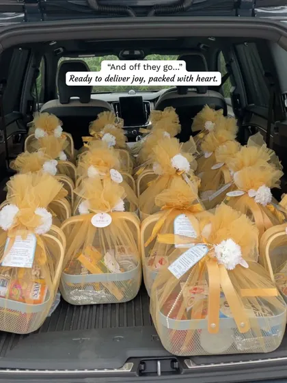 And off they go. The car boot filled with beautifully wrapped naming ceremony hampers, ready to deliver joy to our client's guests.