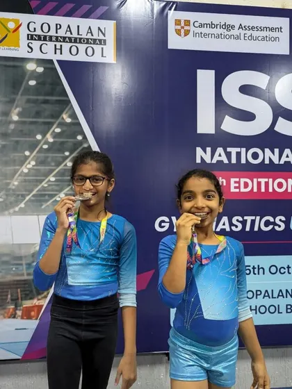 All smiles with their medals. These moments of achievement are what make the gymnastics journey so rewarding.