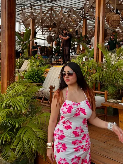 A stylish floral dress from NewMe, perfect for a brunch date. This look is fresh, summery, and effortlessly chic.