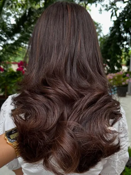 Her first ever hair color. We went with a subtle, natural-looking highlight to ease her into the world of color.