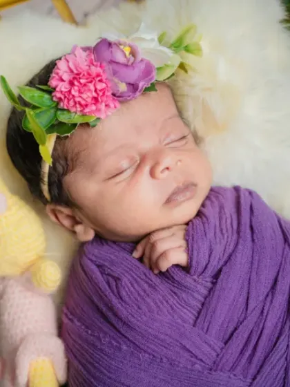 Dreaming in a field of flowers. A simple floral crown and a few well-placed props are all it takes to create a magical garden for your little one.