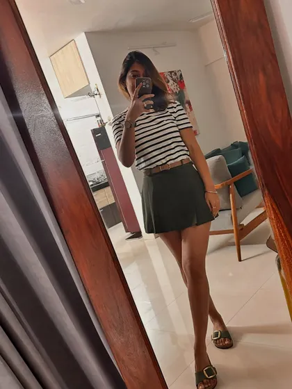This is my casual, sporty style. A striped t-shirt, a simple skirt, and comfortable flats. Your personal style could be sporty, dramatic, edgy, or a mix of many things.